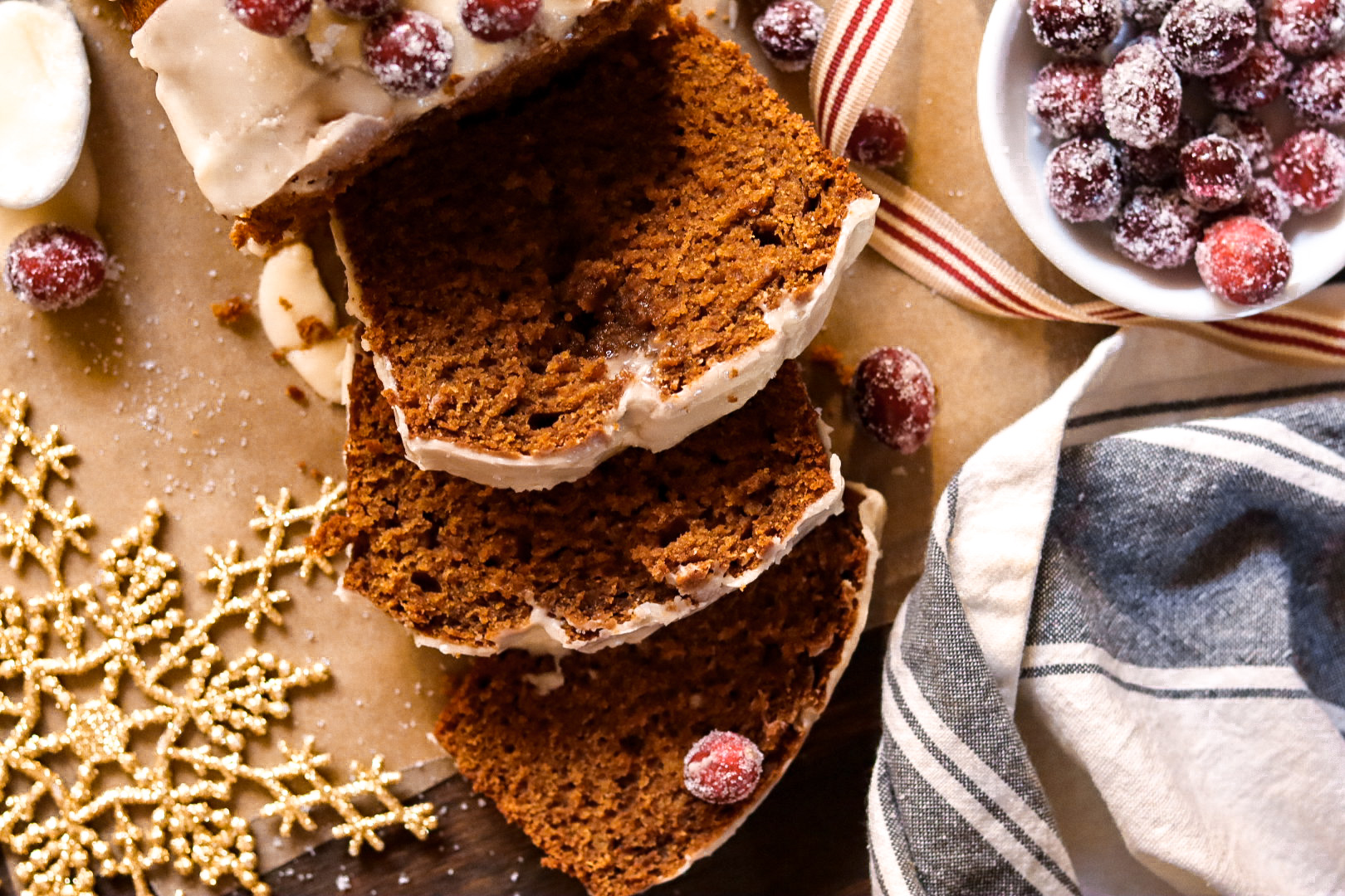 frosted gingerbread loaf with sugared cranberries