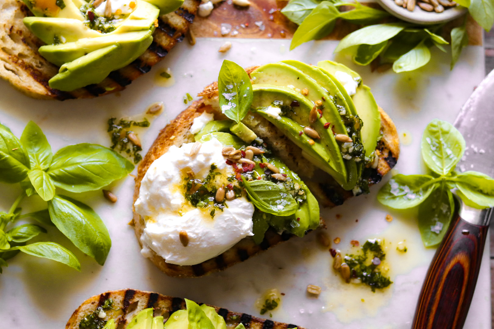 burrata avocado toast with basil vinaigrette