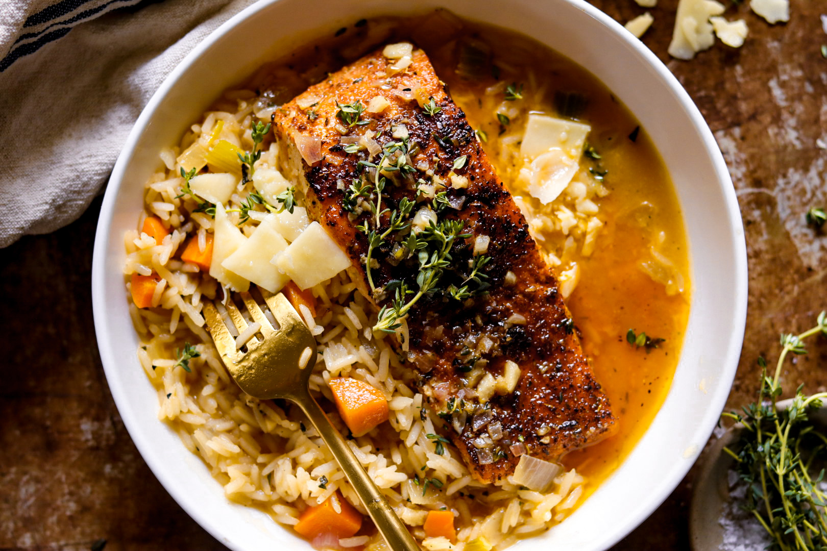 garlic butter blackened salmon scampi with parmesan rice