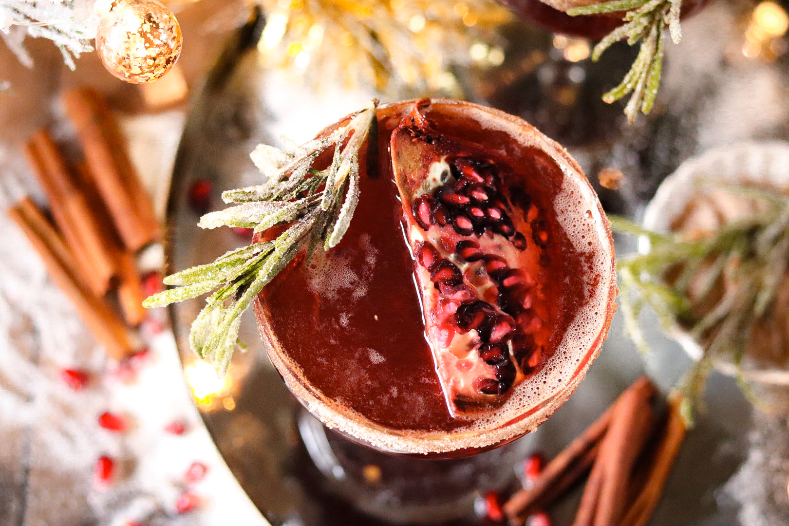 spiced pomegranate bourbon fizz