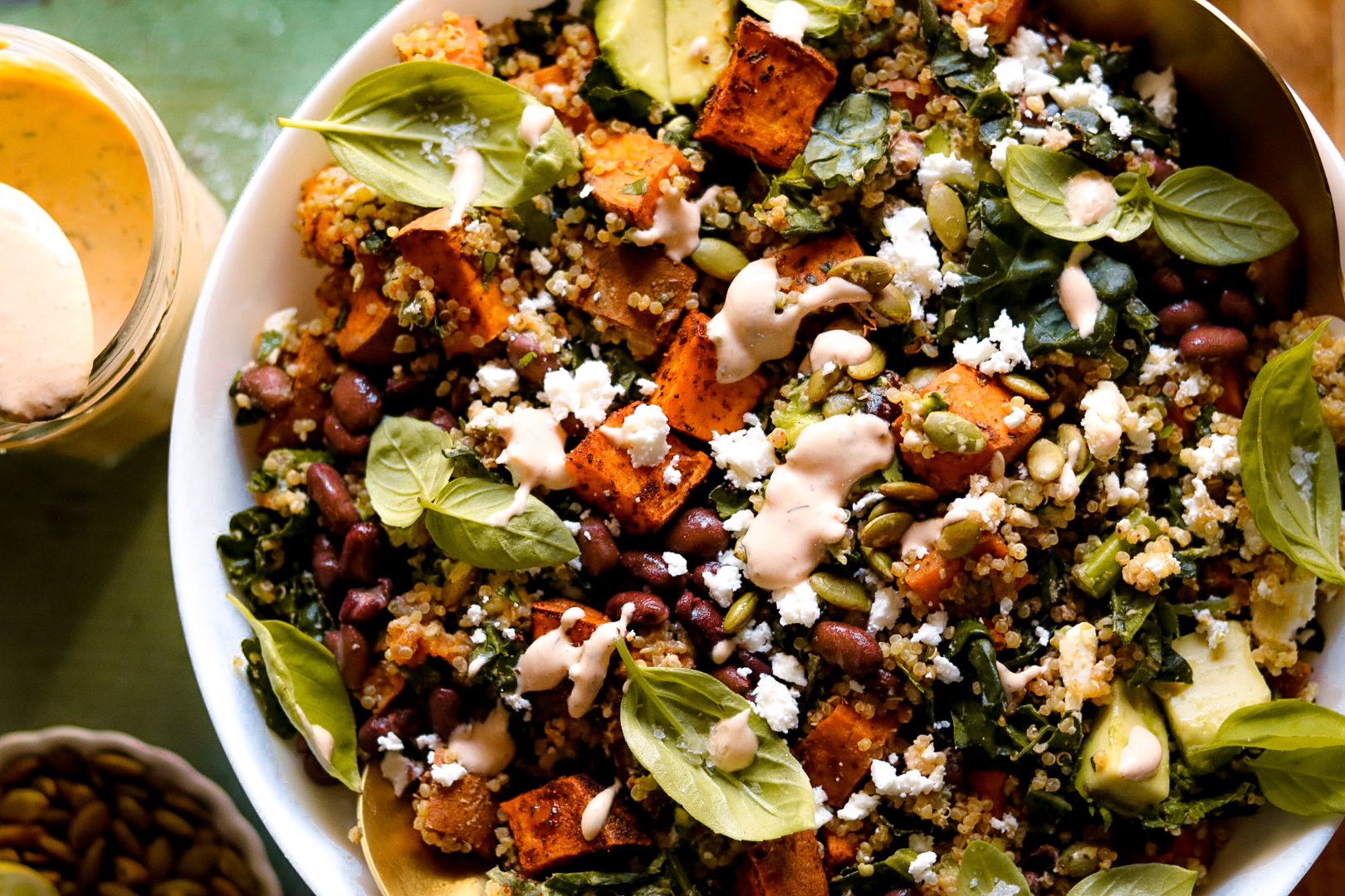 warm and spicy southwest quinoa kale salad with chipotle tahini ranch