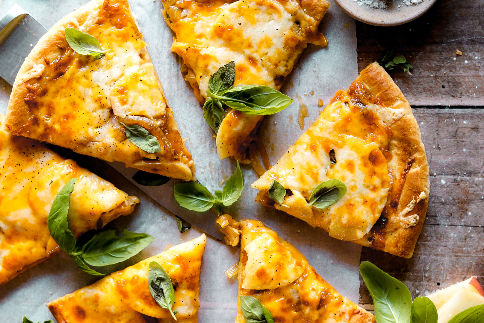 sweet and savory cheddar, apple, and caramelized onion pizza